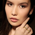 1.00 carat boucles d’oreilles en or jaune avec diamants princesses