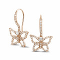 0.70 carat boucles d’oreilles design papillon en or rouge et diamants