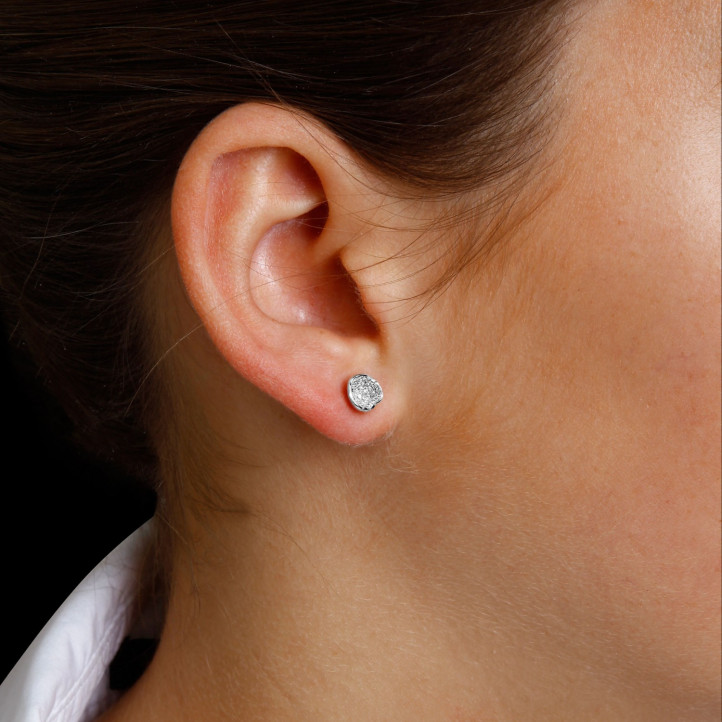 0.25 carat boucles d’oreilles design en or blanc et diamants