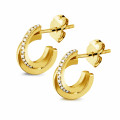 0.20 carat boucles d’oreilles design en or jaune et diamants