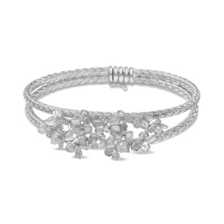 Bracelet en or - 0.55 carats bracelet design fleurs esclave en or blanc avec diamants