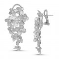 0.70 carats boucles d’oreilles design fleurs en or blanc avec diamants