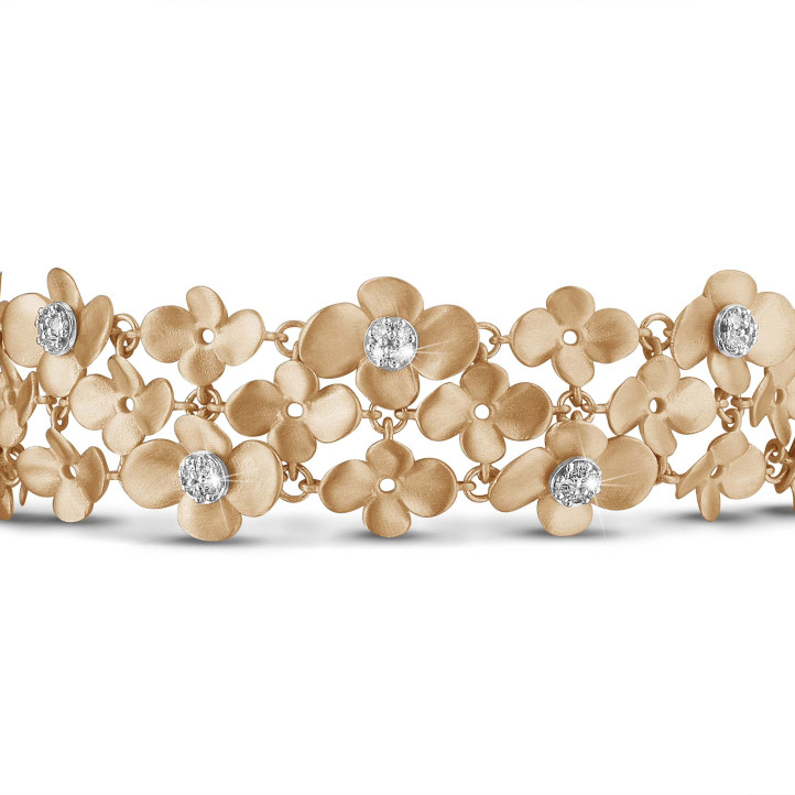 0.75 carats bracelet design fleurs en or rouge avec diamants