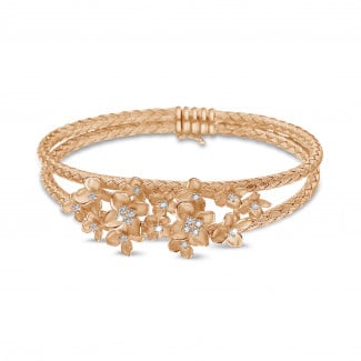 Bracelets - 0.55 carats bracelet design fleurs esclave en or rouge avec diamants