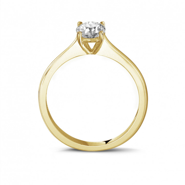 0.50 carats bague solitaire en or jaune avec un diamant rond et quatre griffes