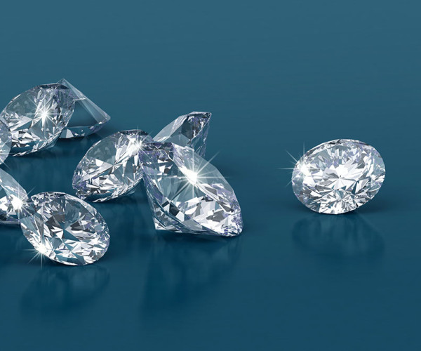 shimmering brilliant cut diamonds on a blue backdrop