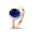 Anello Halo in oro rosso con zaffiro ovale