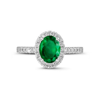 Anelli - Anello solitario Halo in oro bianco con smeraldo ovale e piccoli diamanti