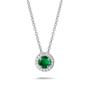 Collane - Collana Halo in platino con smeraldo centrale e diamanti rotondi