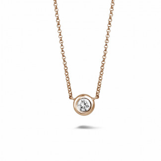 Pendente satellite con diamante da 0,50 carati in oro rosso