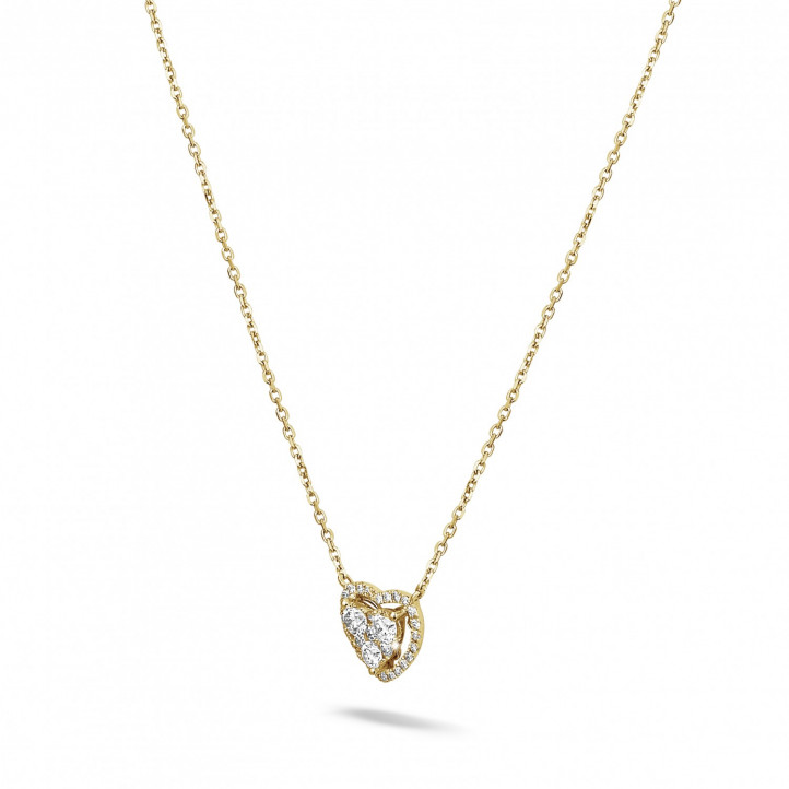 Collana a forma di cuore da 0,65 carati in oro giallo con diamanti rotondi
