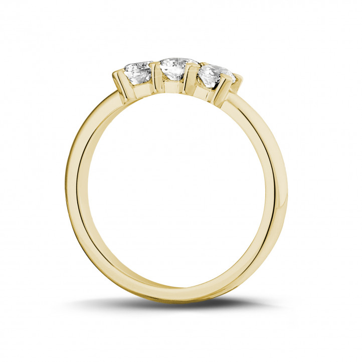 0.50 carat trilogy ring in yellow gold with round diamonds