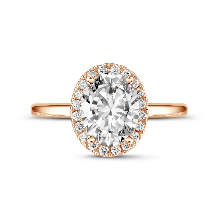 2.00Ct halo ring in red gold with oval diamond