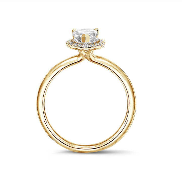 1.00Ct halo ring in yellow gold with pear diamond