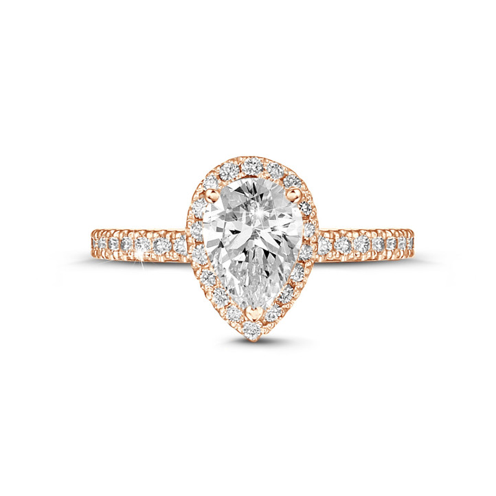 1.20Ct halo ring in red gold with pear diamond
