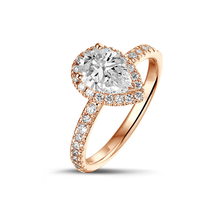 1.50Ct halo ring in red gold with pear diamond