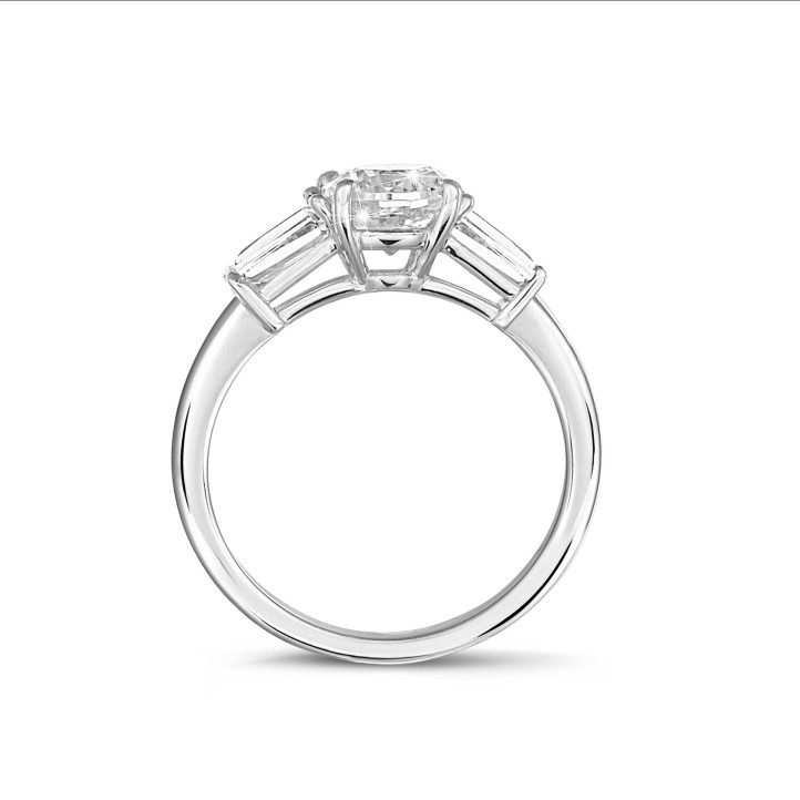 1.00 carat trilogy ring in white gold with a round diamond and tapered baguettes