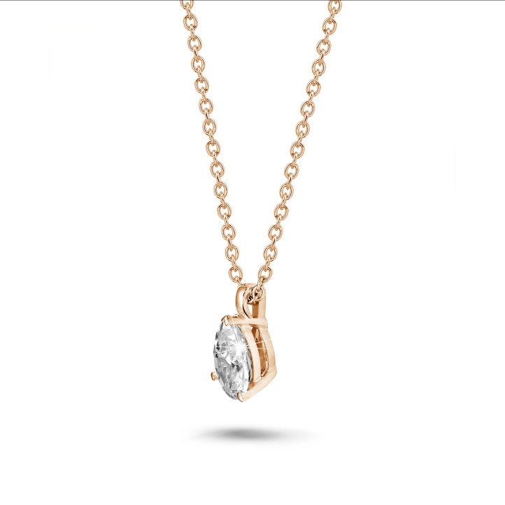1.00 carat solitaire pear cut diamond pendant in red gold