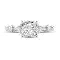 1.00 carat trilogy ring in platinum with a cushion diamond and tapered baguettes