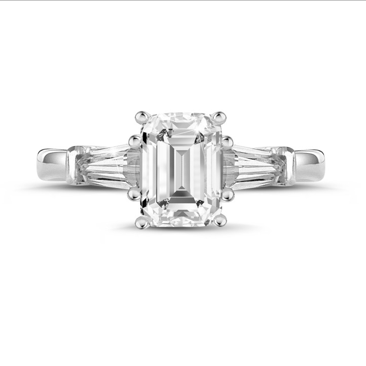 1.00 carat trilogy ring in white gold with an emerald cut diamond and tapered baguettes