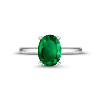 ルビー、サファイヤ、エメラルド付きのジュエリー - Ring in white gold with oval emerald
