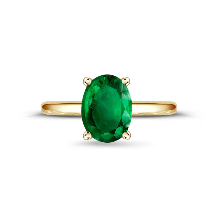 Ring in yellow gold with oval emerald