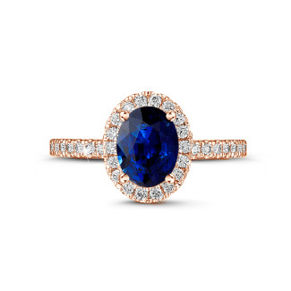 エンゲージリング - Halo solitaire ring in red gold with an oval sapphire and small diamonds