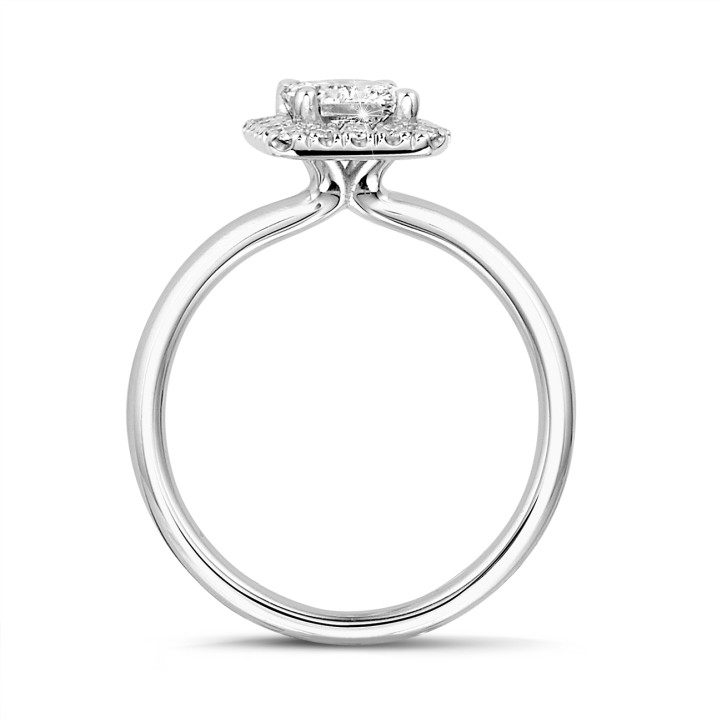 1.20 carat solitaire halo ring with a radiant cut diamond in white gold with round diamonds