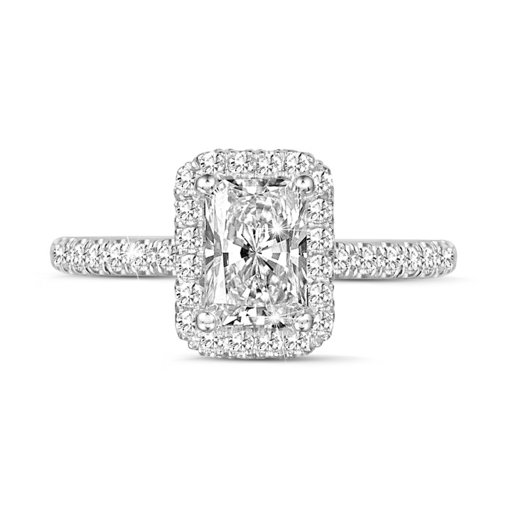 0.70 carat solitaire halo ring with a radiant cut diamond in white gold with round diamonds