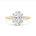 Bespoke hidden halo ring with an oval cut diamond