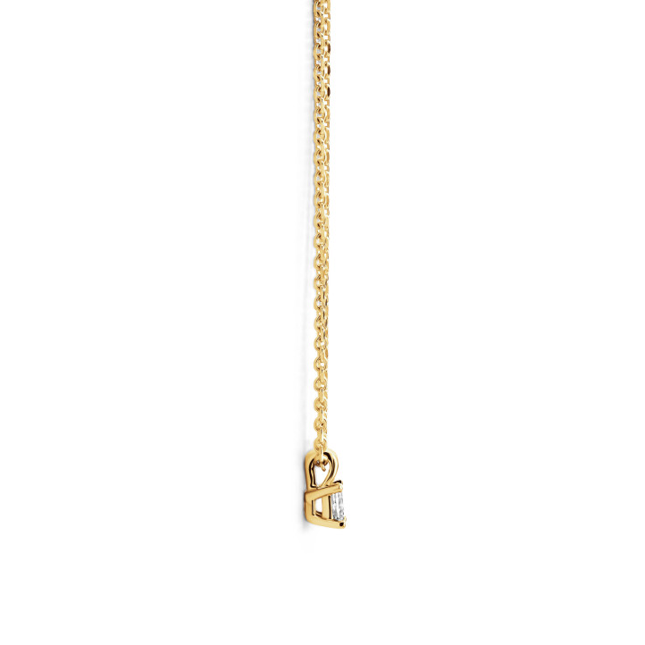 0.15 carat solitaire pendant with a radiant cut diamond in yellow gold
