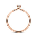 0.15 carat solitaire ring with a round cut diamond in red gold