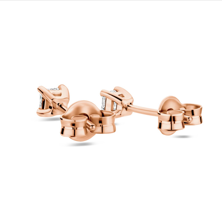 0.30 carat solitaire earrings withn asscher cut diamonds in red gold