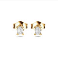 0.30 carat solitaire earrings with emerald cut diamonds in yellow gold