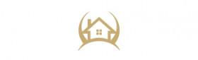 Gold BAUNAT logo with a stylized house and diamond-shaped roof icon