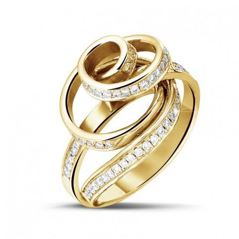 yellow gold engagement ring - A 14 carat yellow gold engagement ring consists of 14 out of 24 parts made of fine gold.
