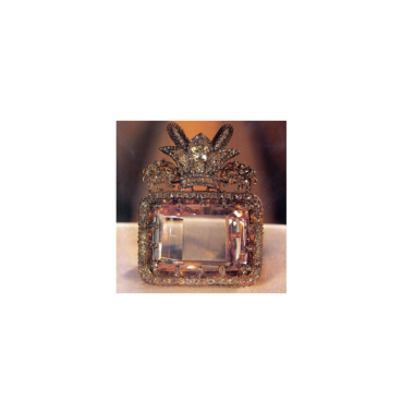 la célèbre broche en diamant rose Daria-I-Noor dans un superbe cadre en or