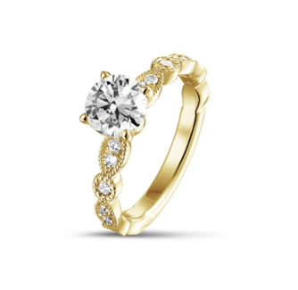 1 karaat geelgouden ring met een ronde solitaire diamant in een klassiek, vintage marquise ontwerp