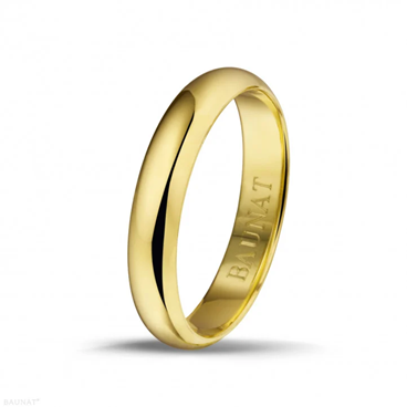 yellow gold ring with a minimalist band engraved with the words ‘BAUNAT’