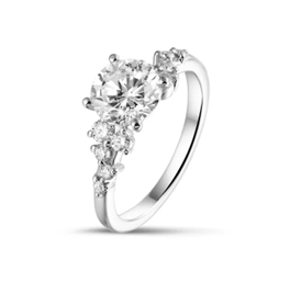 radiant 1.00 carat cluster ring in white gold with a round diamond in solitaire setting