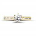 0.50 karaat diamanten solitaire ring in geel goud met zijdiamanten