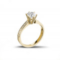1.00 karaat diamanten solitaire ring in geel goud met zijdiamanten