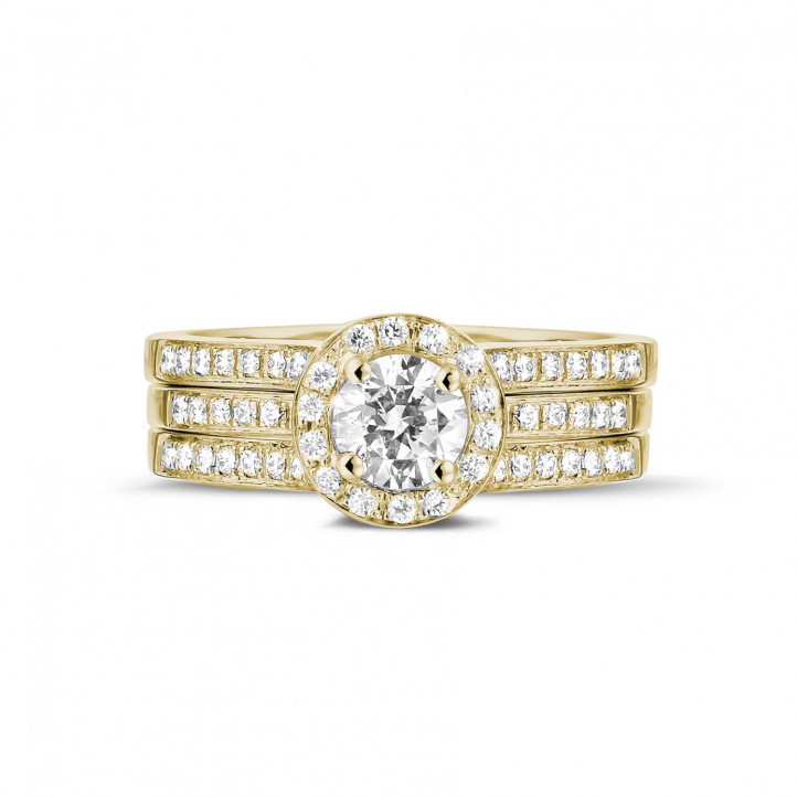 0.50 karaat diamanten solitaire ring in geel goud met zijdiamanten