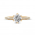 1.00 karaat solitaire ring in geel goud met zijdiamanten