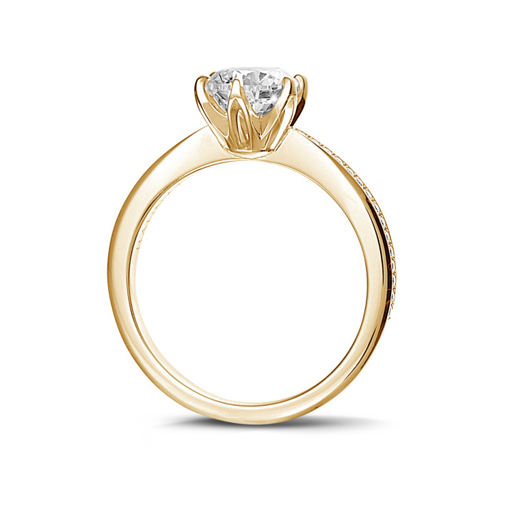 0.70 karaat solitaire ring in geel goud met zijdiamanten