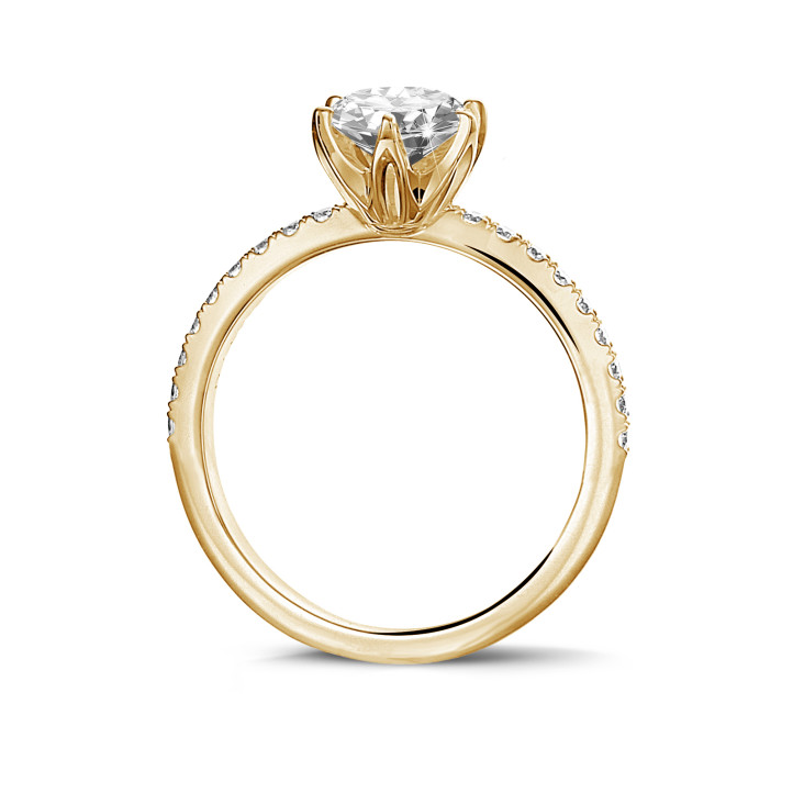 0.70 karaat solitaire ring in geel goud met zijdiamanten