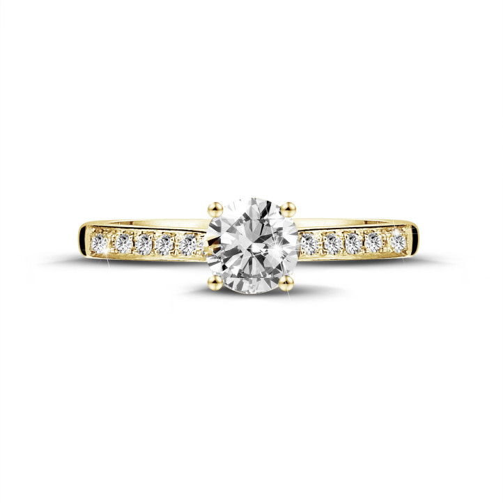0.70 karaat solitaire ring in geel goud met vier griffen en zijdiamanten