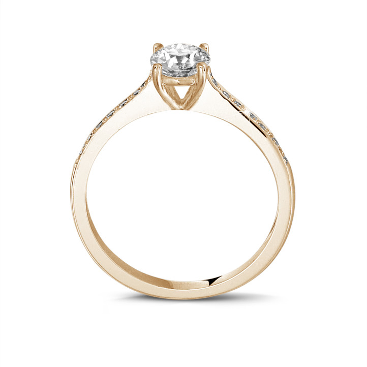 0.70 karaat solitaire ring in rood goud met vier griffen en zijdiamanten