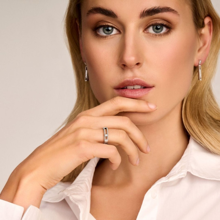 0.55 karaat oorbellen in geel goud met zwevende ronde diamanten