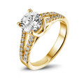 1.25 karaat solitaire ring in geel goud met zijdiamanten